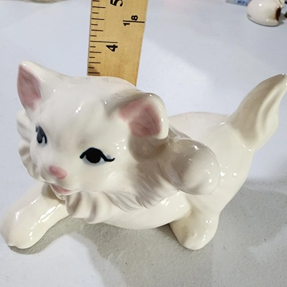 Vintage White Ceramic Kitten Figurine Playful Pouncing Cat Blue Eyes